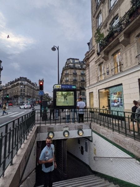  Entrances of the Paris Metro stations vary in style which indicates the difference of time periods when each station has started operating