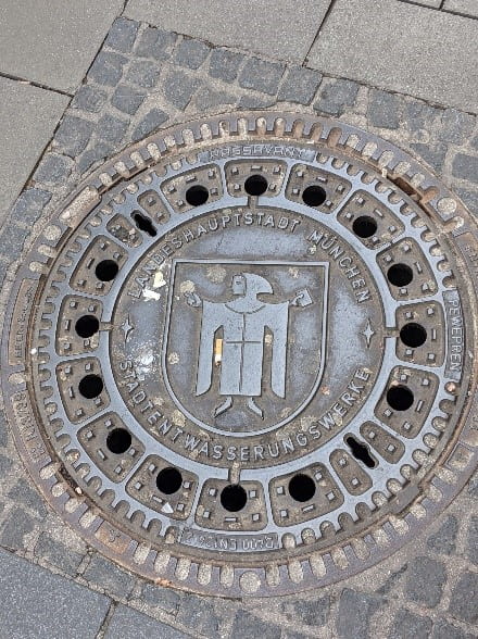 Munich’s coat of arms on a manhole cover