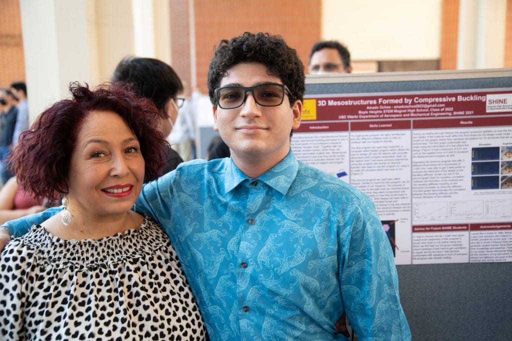 Amado and family at the SHINE poster session.